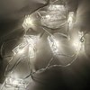 Imagen de Luces led x10, guía de 10 palillos luces blancas, a pila, 2AA, en caja de mica