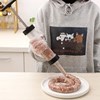 Imagen de Embutidora, de plástico, para rellenar chorizos churros, etc con 3 punteros, en bolsa