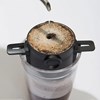 Imagen de Filtro de café reutilizable plegable, de acero inoxidable para taza, en caja
