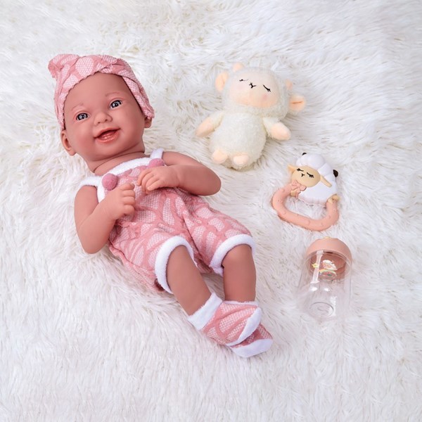 Imagen de Bebote de goma, con mamadera y accesorios, en caja