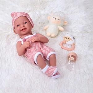 Imagen de Bebote de goma, con mamadera y accesorios, en caja