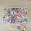 Imagen de Cuentas para armar pulseras y collares, en caja de plástico